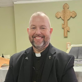 Father Wayne Lewis